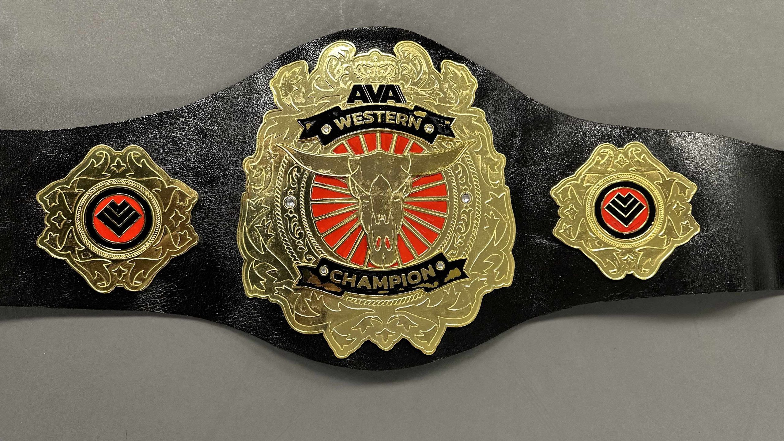 Full view of the intricate AVA Western Bull Belt, symbolizing strength and victory.